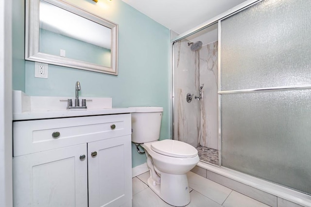 bathroom with toilet, a stall shower, tile patterned flooring, and vanity