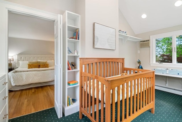 carpeted bedroom with lofted ceiling, an AC wall unit, baseboard heating, and recessed lighting