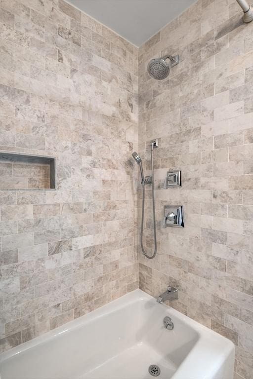 bathroom featuring bathing tub / shower combination