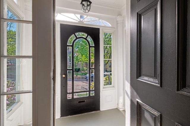 foyer entrance with crown molding