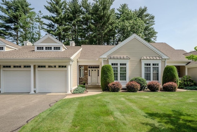 124 High Pine Cir Unit 124, Wilbraham, MA 01095 - view of front facade with an attached garage, asphalt driveway, a front yard, and roof with shingles