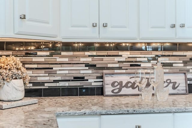 124 High Pine Cir Unit 124, Wilbraham, MA 01095 - kitchen view of decorative backsplash, white cabinets, and light stone counters