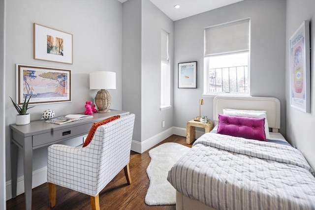 bedroom featuring baseboards, recessed lighting, and wood finished floors