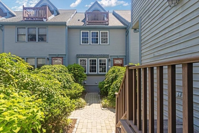 35 Merrymount Rd Unit 12, Quincy, MA 02169 - rear view of property featuring a balcony and a shingled roof