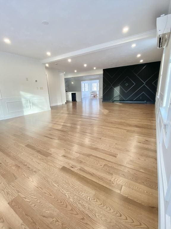 spare room featuring light hardwood / wood-style floors