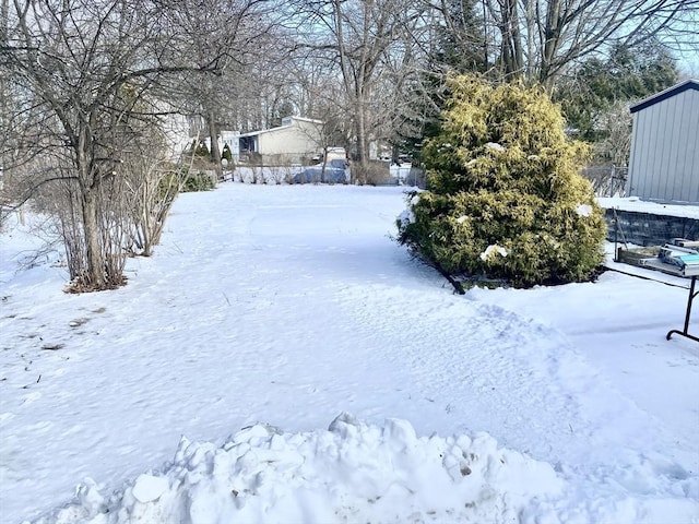 view of snowy yard