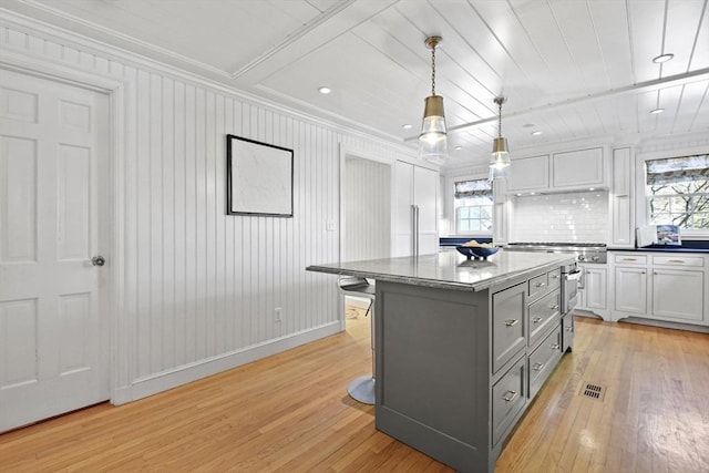 15 Alden Rd, Wellesley, MA 02481 - kitchen featuring gray cabinetry, light wood-type flooring, a center island, decorative light fixtures, and ornamental molding