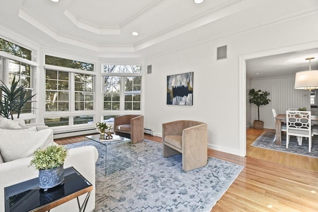 15 Alden Rd, Wellesley, MA 02481 - living room featuring plenty of natural light, crown molding, wood finished floors, baseboard heating, and baseboards