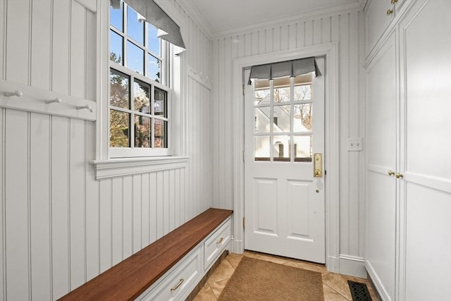 15 Alden Rd, Wellesley, MA 02481 - mudroom with ornamental molding, plenty of natural light, and light tile patterned floors