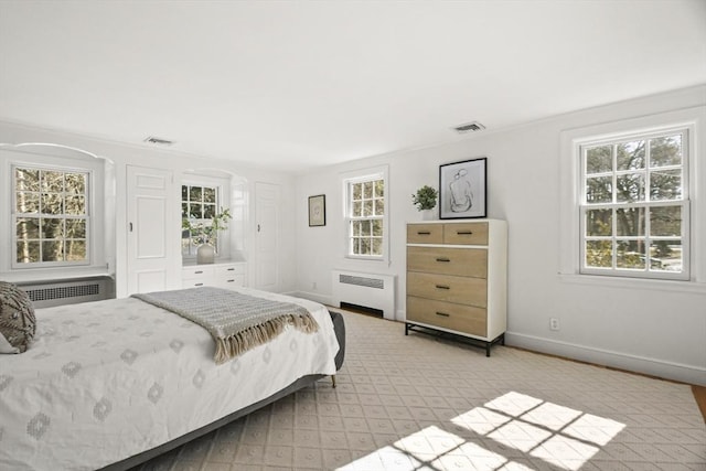 15 Alden Rd, Wellesley, MA 02481 - bedroom featuring radiator heating unit, baseboards, and light colored carpet