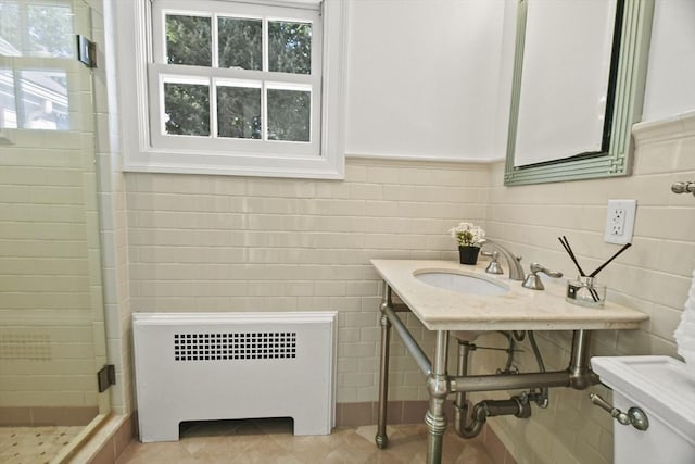 15 Alden Rd, Wellesley, MA 02481 - full bath with radiator heating unit, a stall shower, tile patterned floors, and tile walls
