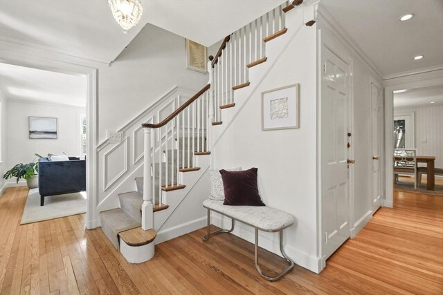 15 Alden Rd, Wellesley, MA 02481 - stairs with hardwood / wood-style floors, ornamental molding, baseboards, and recessed lighting