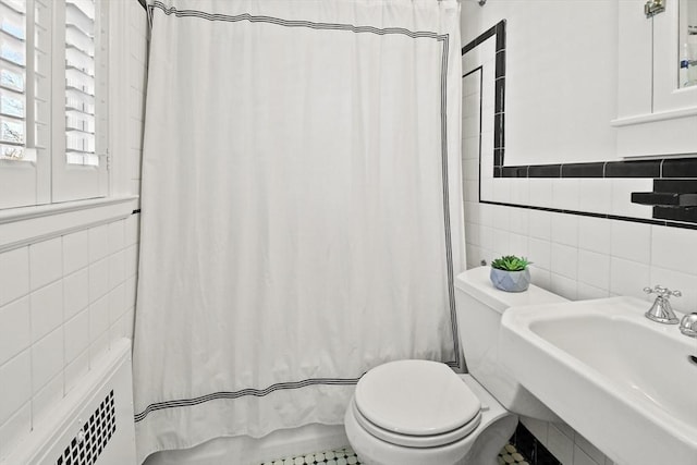 15 Alden Rd, Wellesley, MA 02481 - bathroom with tile walls, toilet, a sink, and shower / tub combo