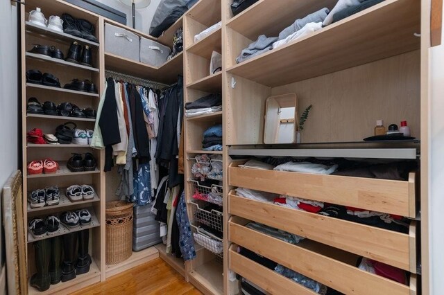 960 Broadway Unit 10, Chelsea, MA 02150 - walk in closet featuring wood finished floors