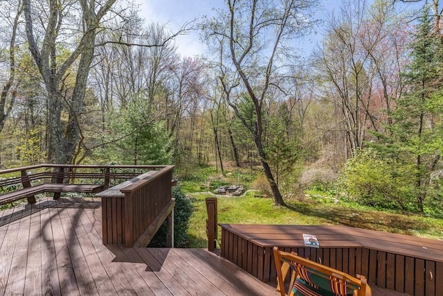 deck featuring a view of trees