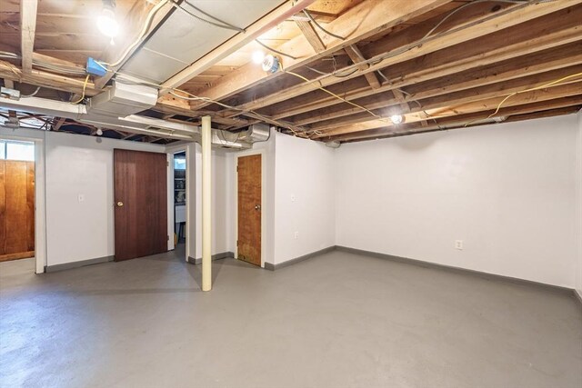 basement featuring baseboards