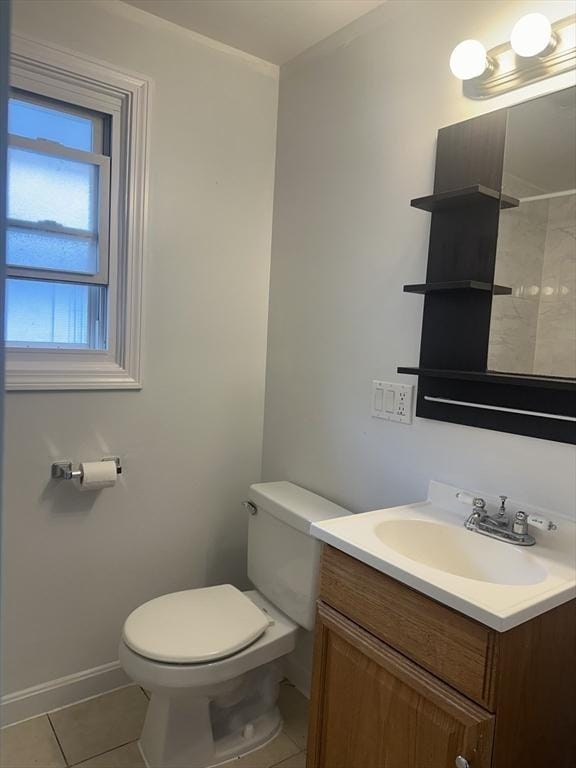 994 Washington St Unit 2, Weymouth, MA 02189 - bathroom with tile patterned floors, toilet, vanity, baseboards, and a shower