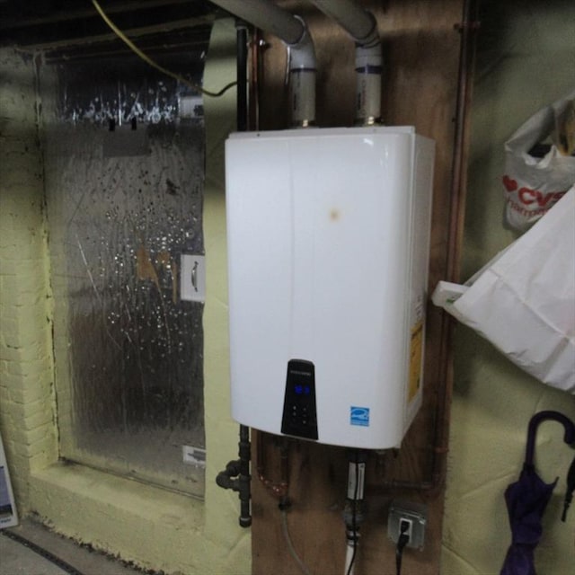 85-87 Belrose Ave, Lowell, MA 01852 - utility room with water heater