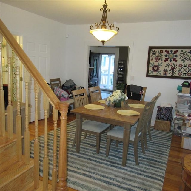 85-87 Belrose Ave, Lowell, MA 01852 - dining room featuring wood finished floors and stairs
