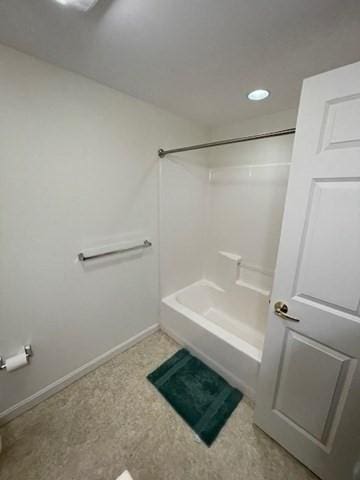 full bath featuring baseboards, bathtub / shower combination, and recessed lighting