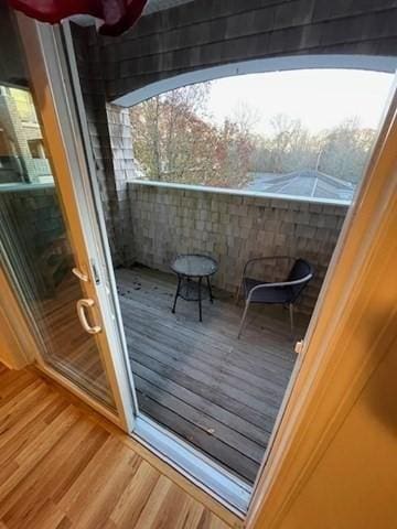 entryway with wood finished floors