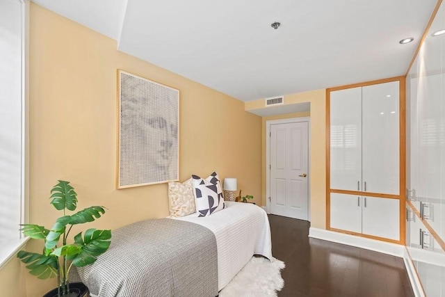 1682 Washington St Unit 8, Boston, MA 02118 - bedroom featuring dark wood-style flooring and recessed lighting