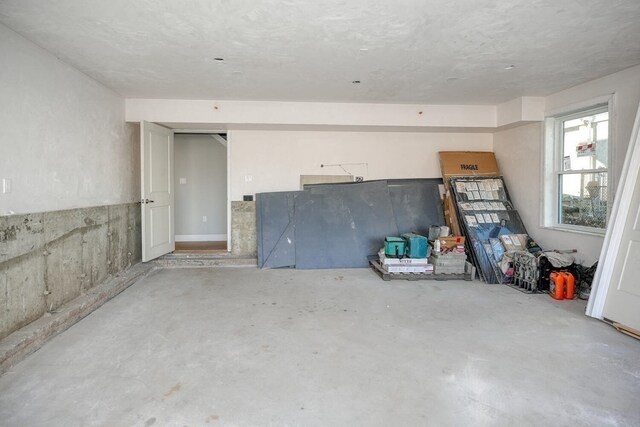 interior space featuring concrete flooring