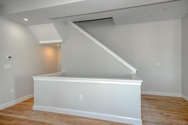 hallway with light wood-type flooring