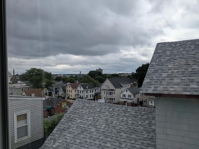 15 10th, Lowell, MA 01850 - detailed view of a residential view and roof with shingles