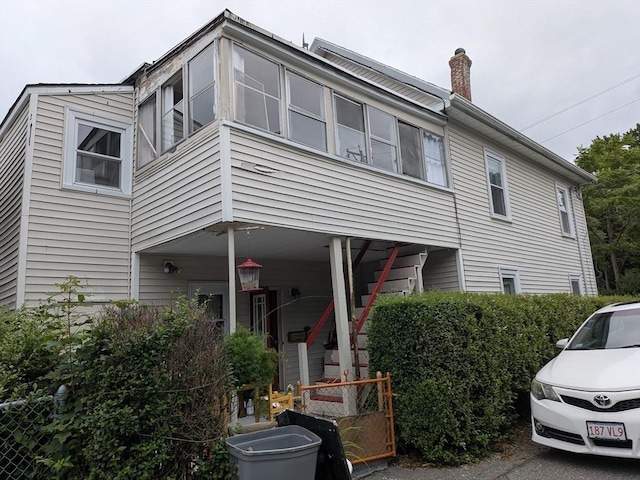 15 10th, Lowell, MA 01850 - view of front facade featuring a chimney