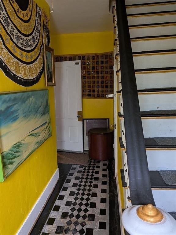 15 10th, Lowell, MA 01850 - stairway featuring baseboards