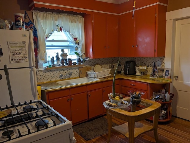 15 10th, Lowell, MA 01850 - kitchen with white appliances, dark wood-style flooring, and red cabinets