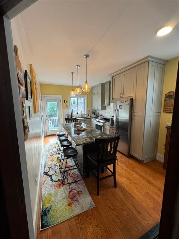 dining space with light wood-type flooring