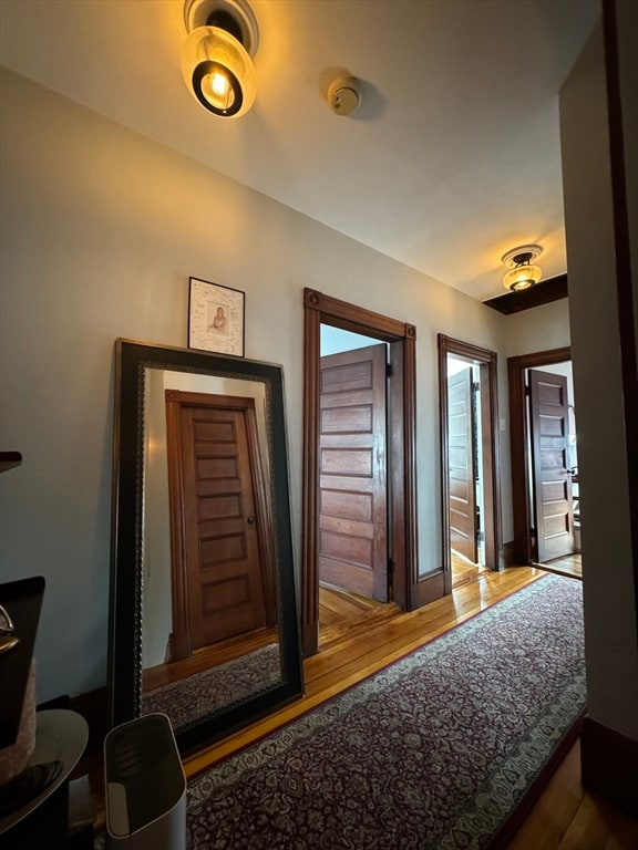 hallway featuring hardwood / wood-style floors