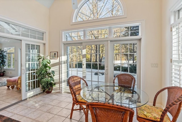 sunroom featuring french doors