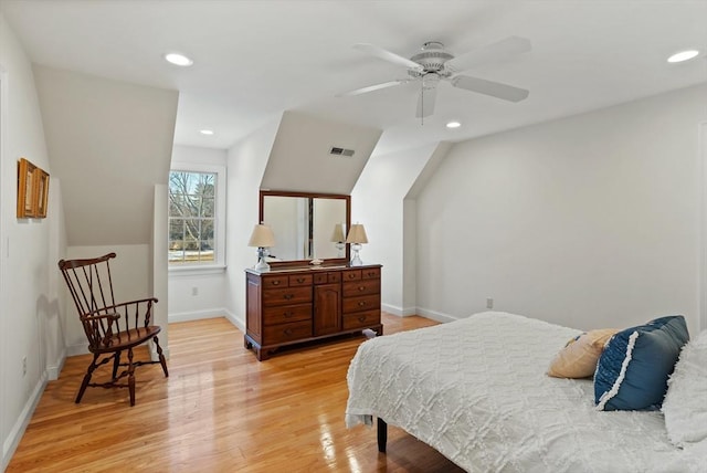 bedroom featuring light wood-style flooring, recessed lighting, visible vents, and baseboards