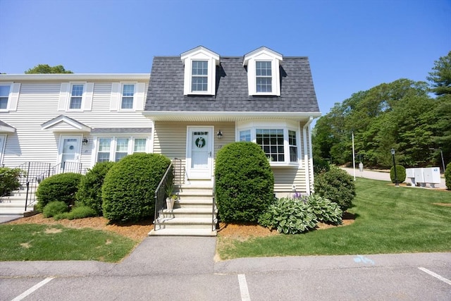 19 Crystal Way Unit 19, Bellingham, MA 02019 - view of front of property featuring roof with shingles, a front yard, and uncovered parking