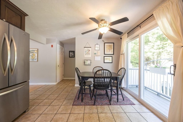 19 Crystal Way Unit 19, Bellingham, MA 02019 - dining area with light tile patterned floors, a ceiling fan, and baseboards
