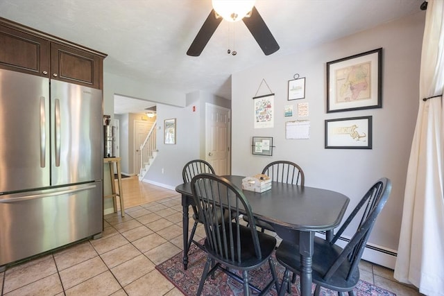 19 Crystal Way Unit 19, Bellingham, MA 02019 - dining room with light tile patterned flooring, a ceiling fan, stairs, baseboards, and a baseboard heating unit