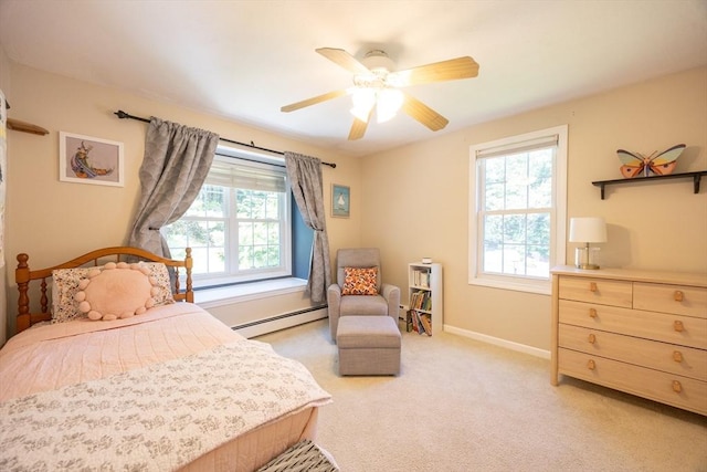 19 Crystal Way Unit 19, Bellingham, MA 02019 - bedroom with a baseboard heating unit, light carpet, baseboards, and a ceiling fan