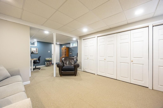 19 Crystal Way Unit 19, Bellingham, MA 02019 - living area with light colored carpet, a desk, a paneled ceiling, and baseboards