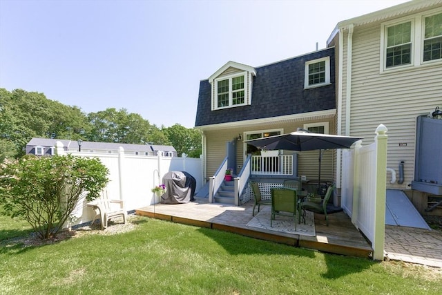 19 Crystal Way Unit 19, Bellingham, MA 02019 - rear view of house with a shingled roof and a wooden deck