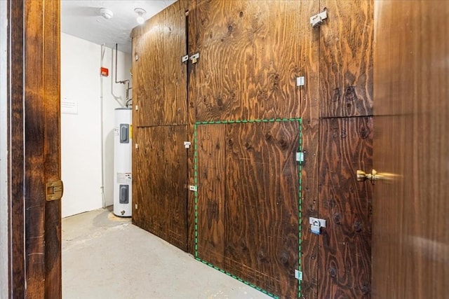 storage room with electric water heater