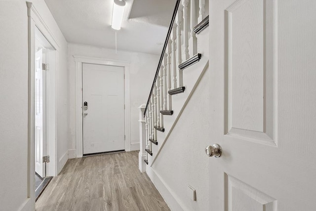 foyer entrance featuring light wood-type flooring