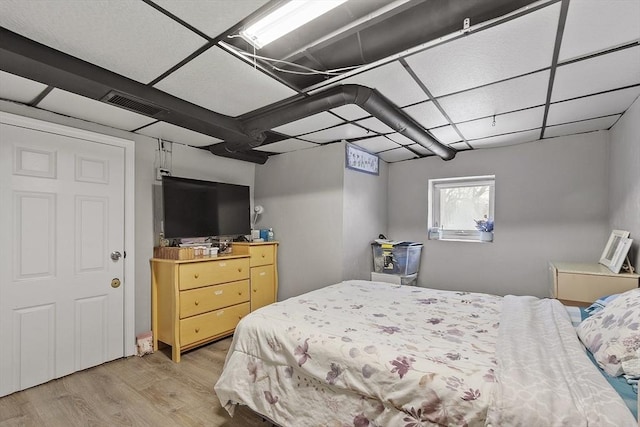 bedroom featuring light hardwood / wood-style floors