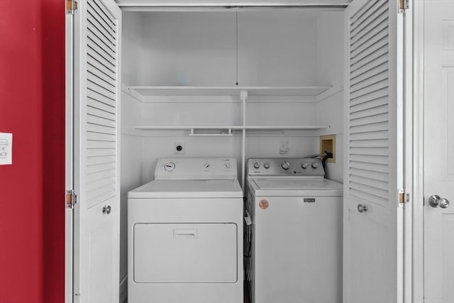 laundry area featuring laundry area and washing machine and dryer