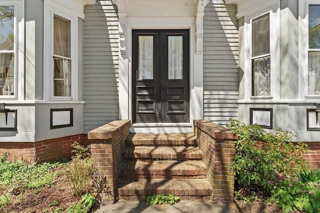 property entrance featuring french doors
