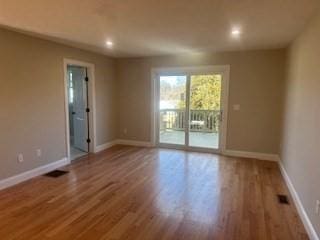 empty room featuring light hardwood / wood-style floors