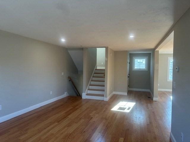 interior space with hardwood / wood-style floors