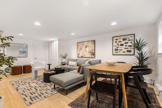 dining space featuring hardwood / wood-style flooring